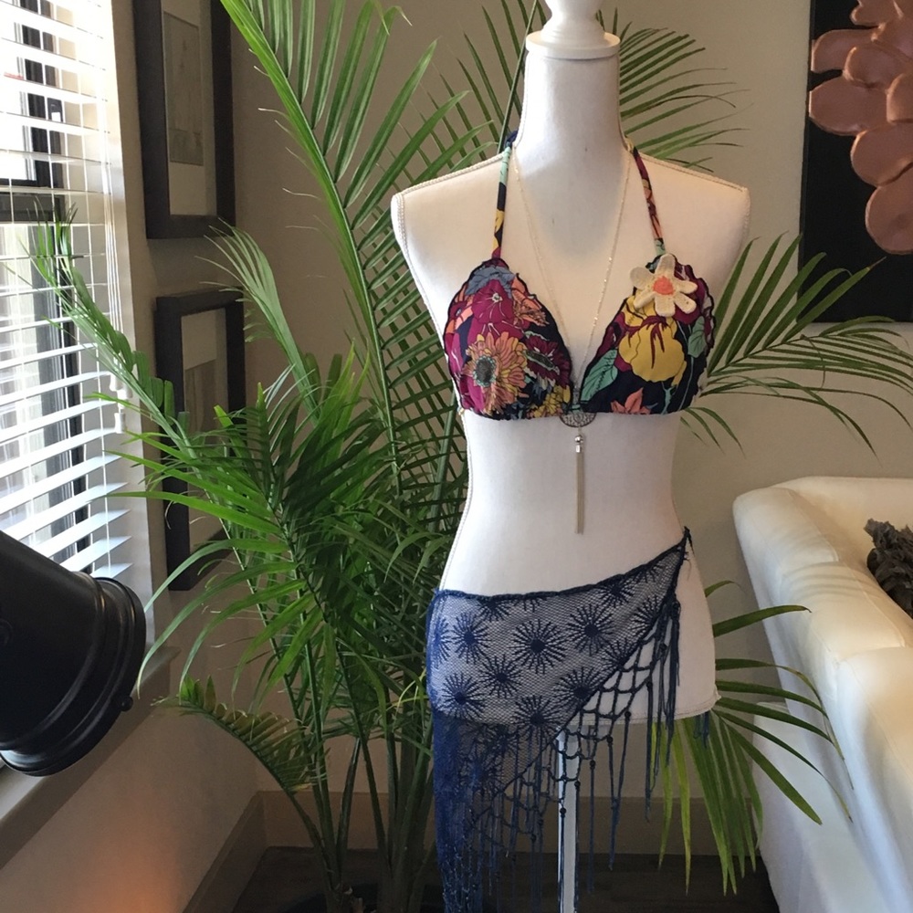 Blue net bikini wrap with blue beads.